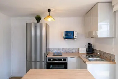 Cuisine ou kitchenette dans l'établissement La Maritime - Vue port, 50 m de la plage de la baie
