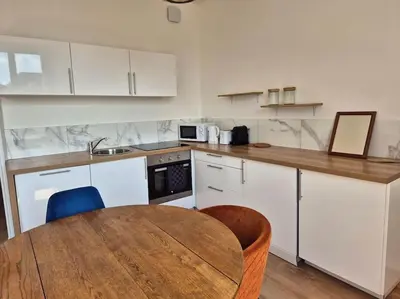 Cuisine ou kitchenette dans l'établissement Le prospère - wifi - central