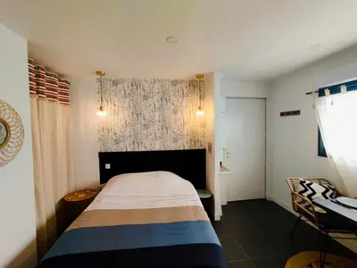 Un ou plusieurs lits dans un hébergement de l'établissement Studio à St Brévin les pins