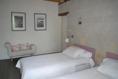 Un ou plusieurs lits dans un hébergement de l'établissement La Petite Boire - Chambres d'hôtes près d'Angers