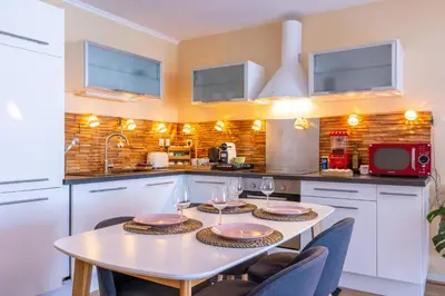 Cuisine ou kitchenette dans l'établissement Le coin du bonheur - Pas de fête