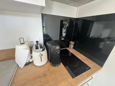 Cuisine ou kitchenette dans l'établissement Chalet rafale proche aéroport Nantes Atlantique