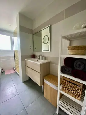 Un ou plusieurs lits dans un hébergement de l'établissement Bel appartement Nantes