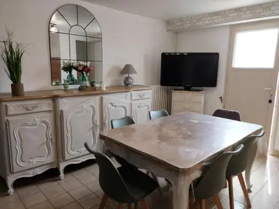 Télévision ou salle de divertissement dans l'établissement Maison de campagne