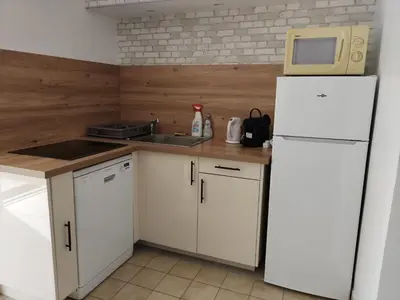 Cuisine ou kitchenette dans l'établissement Maison de campagne