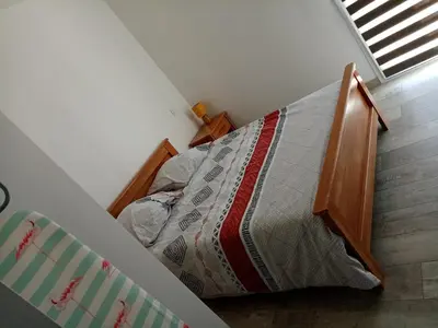 Un ou plusieurs lits dans un hébergement de l'établissement location bord de mer La Plaine sur mer