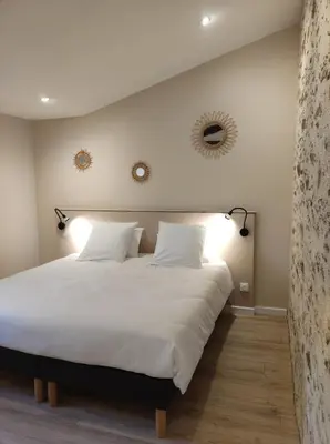 Un ou plusieurs lits dans un hébergement de l'établissement Les Gîtes du Lac - L'Ecurie - Maison 2 chambres 60m2 - Proche Nantes avec Terrasse