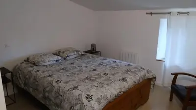 Un ou plusieurs lits dans un hébergement de l'établissement Maison à la campagne