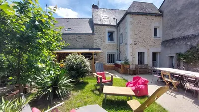 Jardin de l'établissement Chambres dans maison de caractère