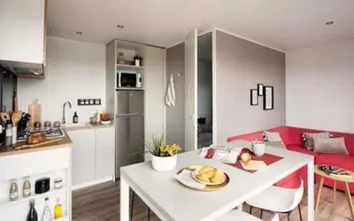 Cuisine ou kitchenette dans l'établissement ZEcamping 4 animé animaux acceptés avec piscine couverte et bar
