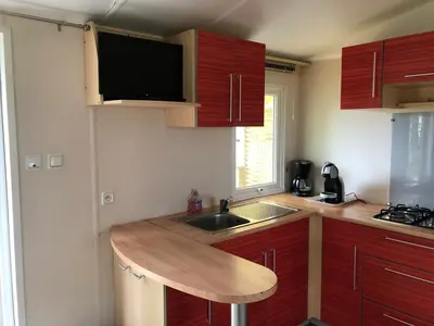 Cuisine ou kitchenette dans l'établissement Bungalow 