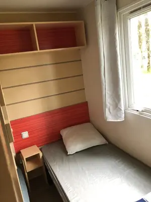 Un ou plusieurs lits dans un hébergement de l'établissement Bungalow 