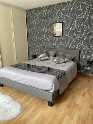 Un ou plusieurs lits dans un hébergement de l'établissement Chambres de l enclose