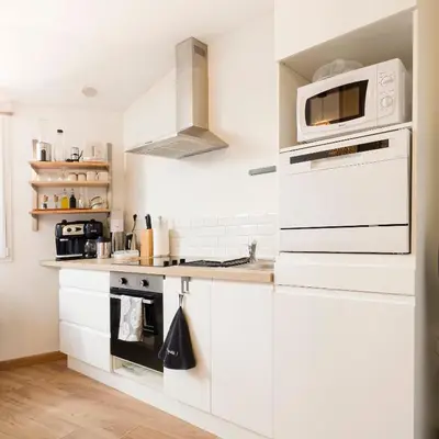 Cuisine ou kitchenette dans l'établissement Studio Tout Confort près Ancenis