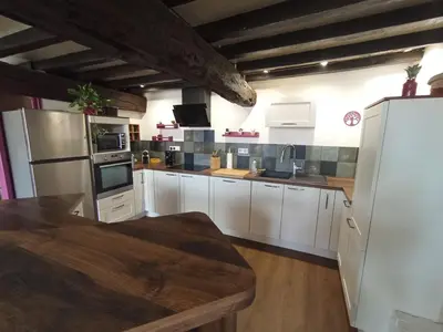 Cuisine ou kitchenette dans l'établissement L'orée du bois