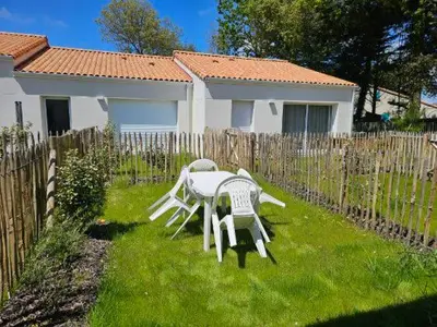 Jardin de l'établissement Maison 1 chambre vélos inclus