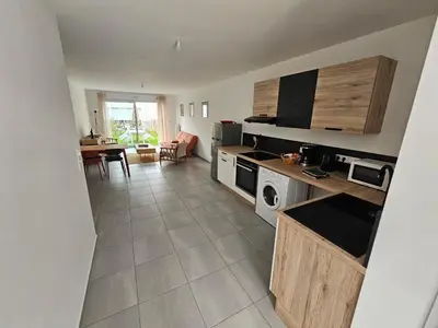 Cuisine ou kitchenette dans l'établissement Maison 1 chambre vélos inclus