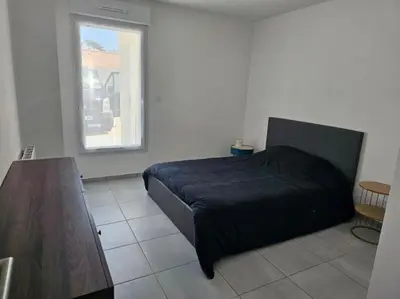 Un ou plusieurs lits dans un hébergement de l'établissement Maison 1 chambre vélos inclus