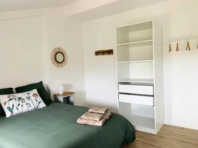 Un ou plusieurs lits dans un hébergement de l'établissement L'Escale, gîte à la campagne