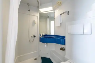 Salle de bains dans l'établissement Hôtel La Petite Auberge