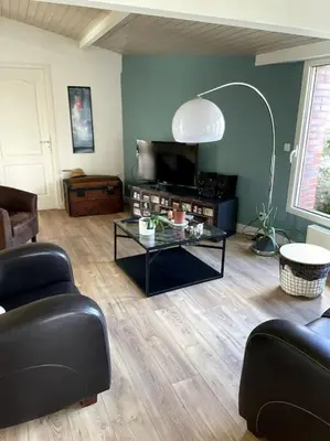 Coin salon dans l'établissement Maison aux volets bleus