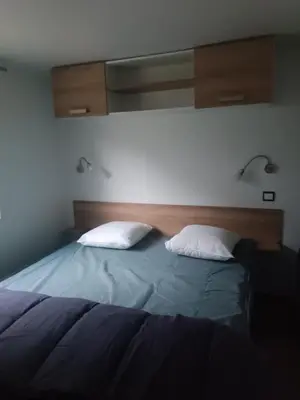 Un ou plusieurs lits dans un hébergement de l'établissement mobil home moderne et spacieux