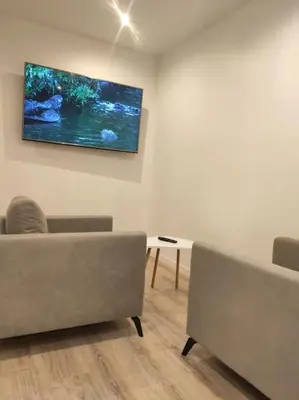 Télévision ou salle de divertissement dans l'établissement Appartement Cosy, 3 Chambres près du centre ville