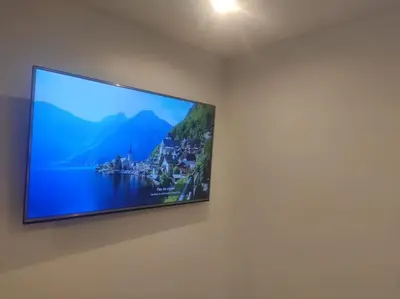Télévision ou salle de divertissement dans l'établissement Appartement Cosy, 3 Chambres près du centre ville