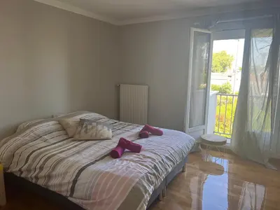 Un ou plusieurs lits dans un hébergement de l'établissement Appartement Nantes Parc des expositions La Beaujoire