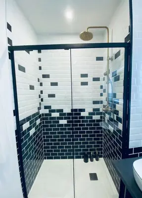 Salle de bains dans l'établissement L'Oasis Angevine - Balneo, Sauna, Home Cinema & Parking