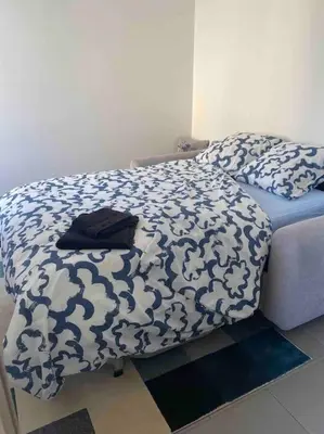 Un ou plusieurs lits dans un hébergement de l'établissement L'appartement des tortues