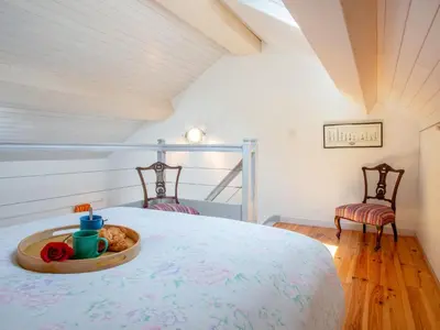 Un ou plusieurs lits dans un hébergement de l'établissement Holiday Home La Maison du Pêcheur by Interhome