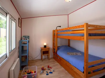 Un ou plusieurs lits dans un hébergement de l'établissement Holiday Home La Maison du Pêcheur by Interhome