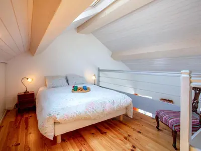 Un ou plusieurs lits dans un hébergement de l'établissement Holiday Home La Maison du Pêcheur by Interhome