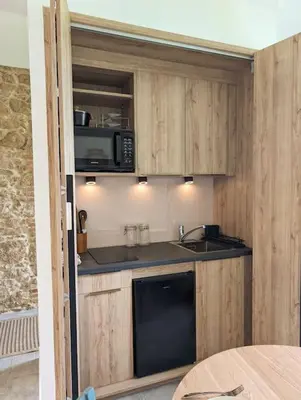 Cuisine ou kitchenette dans l'établissement Studio Les Granges