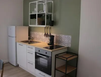 Cuisine ou kitchenette dans l'établissement Petit gîte des trois chemins