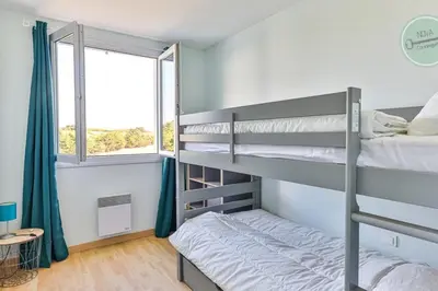 Un ou plusieurs lits dans un hébergement de l'établissement La Goëlette 30 Les mouettes