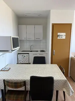 Cuisine ou kitchenette dans l'établissement Le Voilier bleu