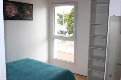Un ou plusieurs lits dans un hébergement de l'établissement Bord de mer