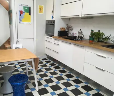 Cuisine ou kitchenette dans l'établissement Chambre ville & campagne