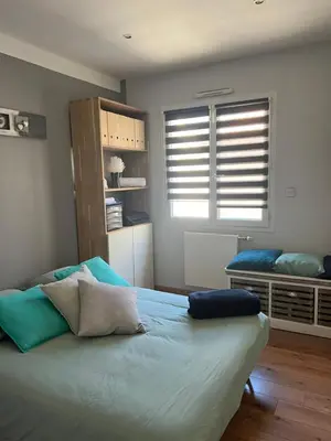Un ou plusieurs lits dans un hébergement de l'établissement Chambre By Kastella