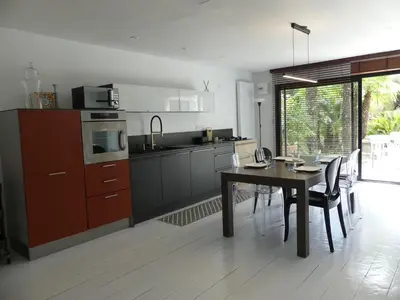 Cuisine ou kitchenette dans l'établissement Les palmes de Jade
