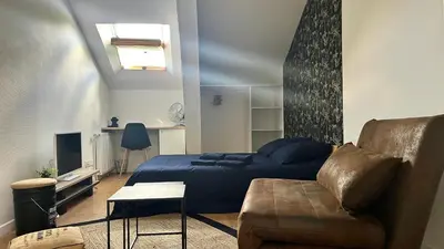 Coin salon dans l'établissement Appartement 3 chambres centre ville Cholet 25min du Puy duFou