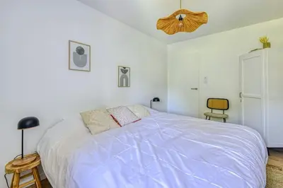 Un ou plusieurs lits dans un hébergement de l'établissement Gîte de l'Etoile, maison rénovée à 18min du PuyduFou