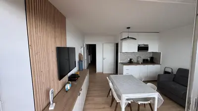 Télévision ou salle de divertissement dans l'établissement Appartement Marina FACE MER