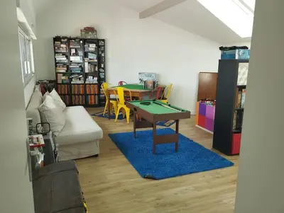 Coin salon dans l'établissement Grande maison familiale avec piscine couverte chauffée à 15 min du centre de Nantes
