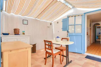 Cuisine ou kitchenette dans l'établissement Maison avec terrasse - 900m plage des Sableaux