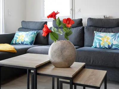 Coin salon dans l'établissement Apartment L'Indigo by Interhome