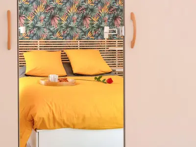 Un ou plusieurs lits dans un hébergement de l'établissement Apartment L'Indigo by Interhome