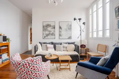 Coin salon dans l'établissement Chambre chez l'habitant - Arty & Élégante - SDB privée
